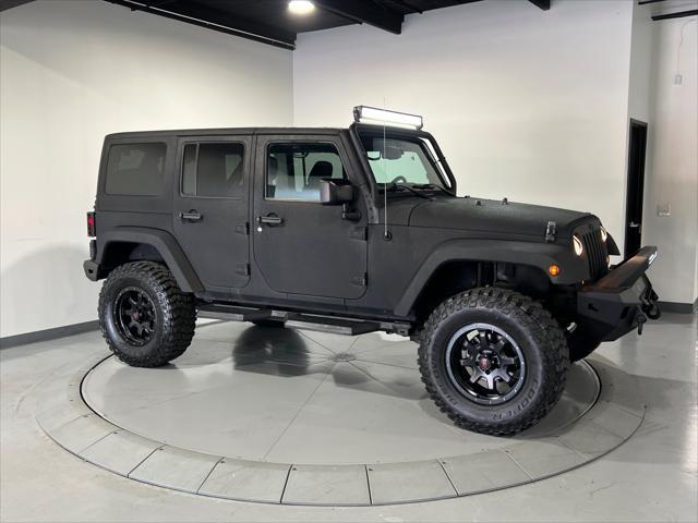 used 2016 Jeep Wrangler Unlimited car, priced at $23,990