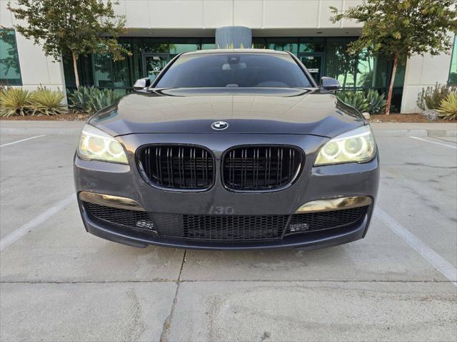 used 2013 BMW 750 car, priced at $13,995