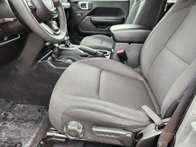 used 2023 Jeep Wrangler car, priced at $27,857