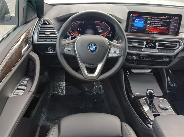 used 2024 BMW X4 car, priced at $48,899