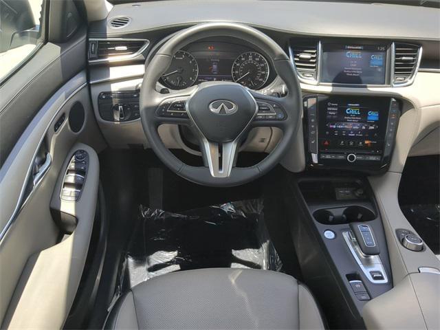 used 2025 INFINITI QX50 car, priced at $39,634