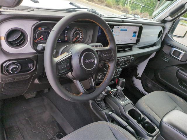 used 2024 Jeep Wrangler car, priced at $33,347