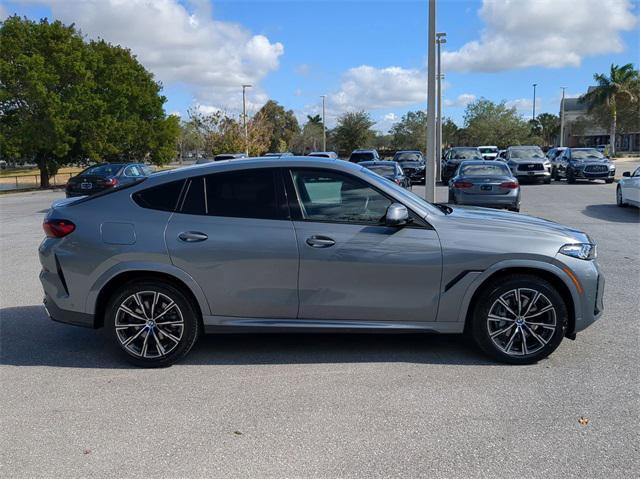 used 2024 BMW X6 car, priced at $66,381