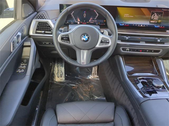 used 2024 BMW X6 car, priced at $66,381