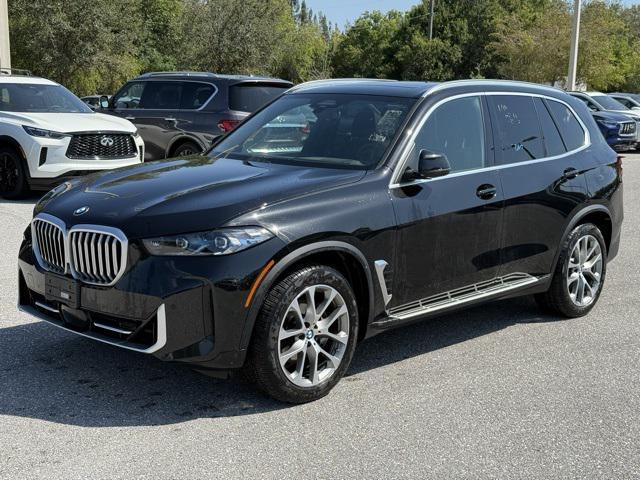 used 2024 BMW X5 car, priced at $55,157