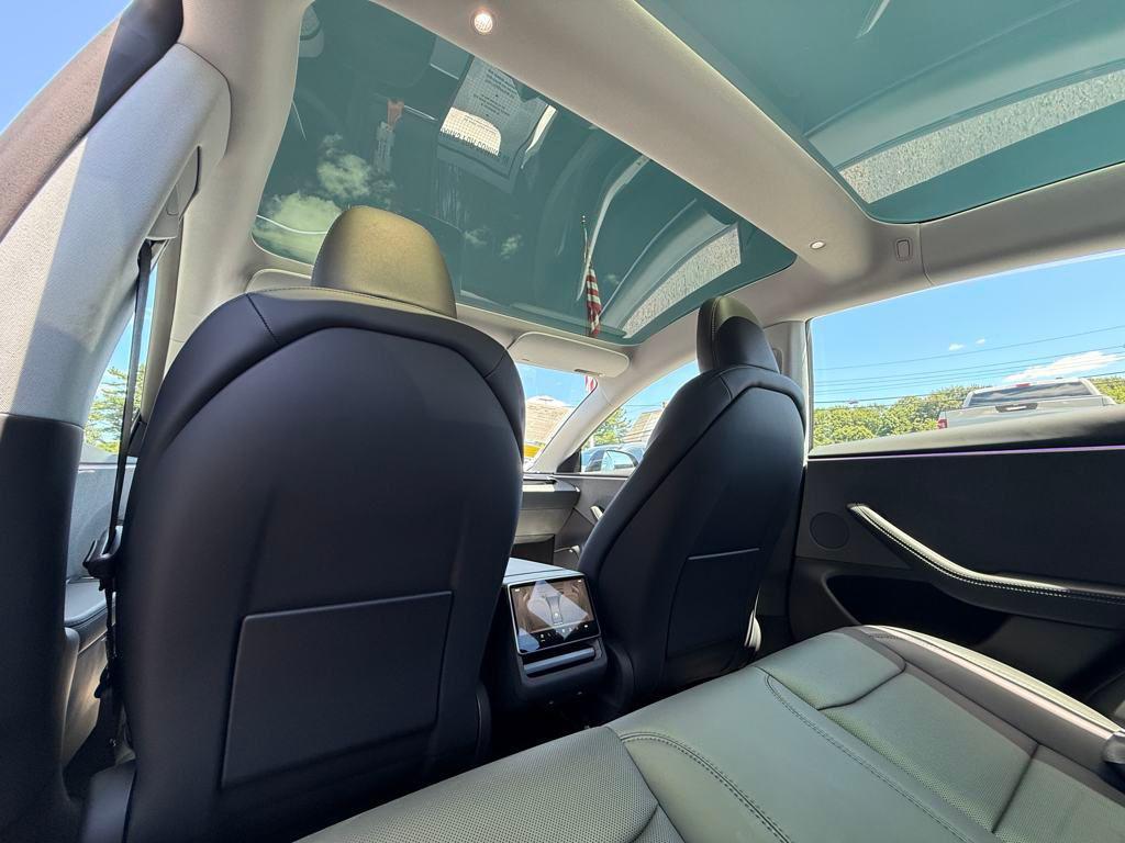 used 2025 Tesla Model 3 car, priced at $34,700