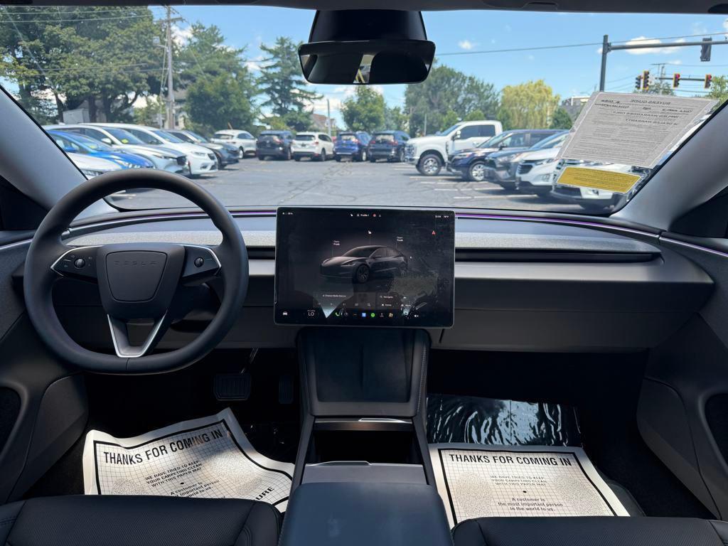 used 2025 Tesla Model 3 car, priced at $34,700
