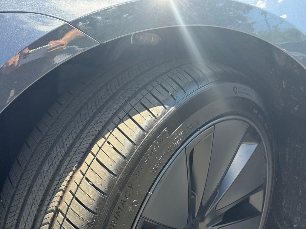 used 2025 Tesla Model 3 car, priced at $34,700