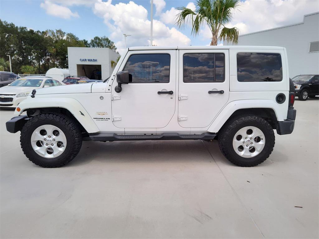 used 2015 Jeep Wrangler Unlimited car, priced at $14,494