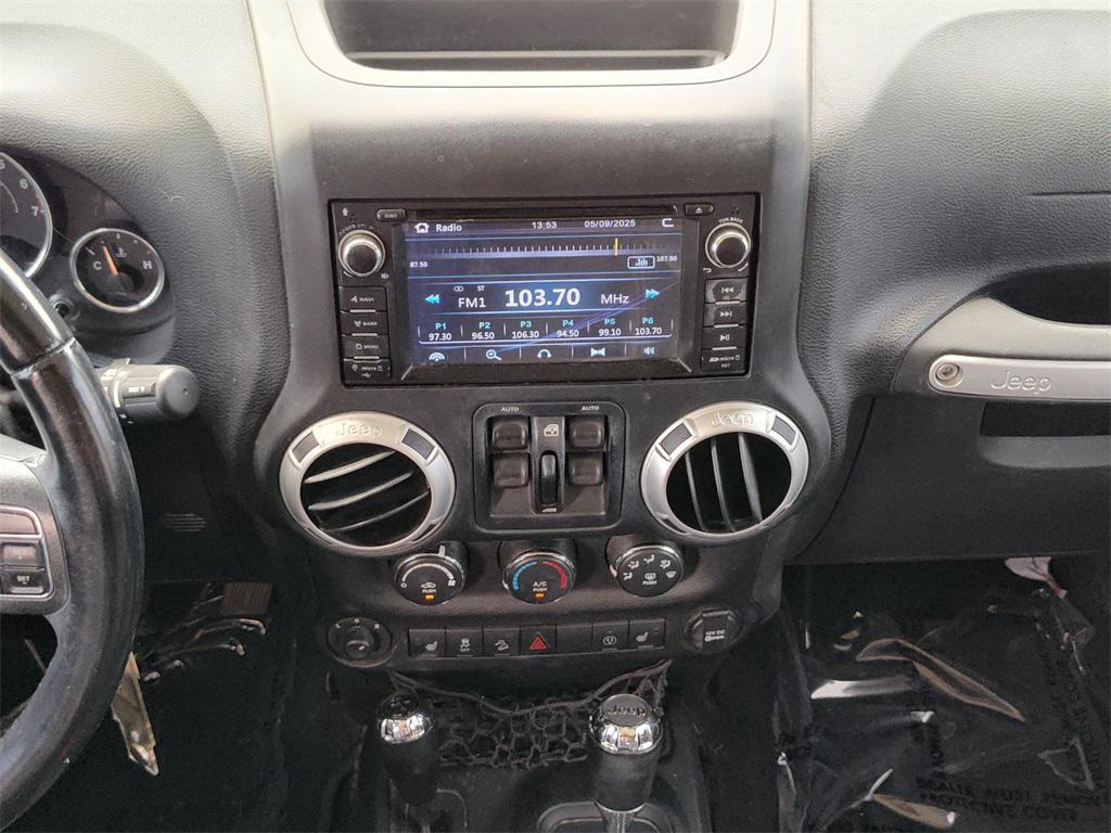 used 2015 Jeep Wrangler Unlimited car, priced at $14,494