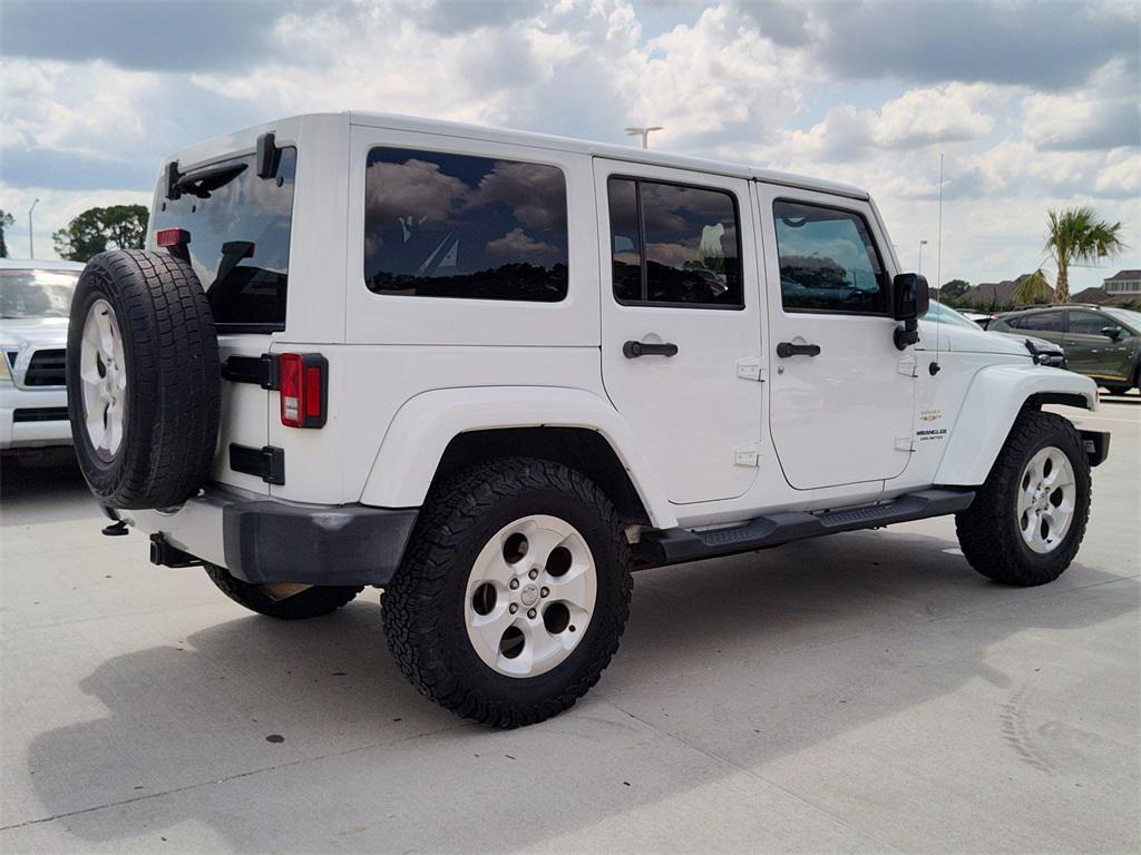 used 2015 Jeep Wrangler Unlimited car, priced at $14,494