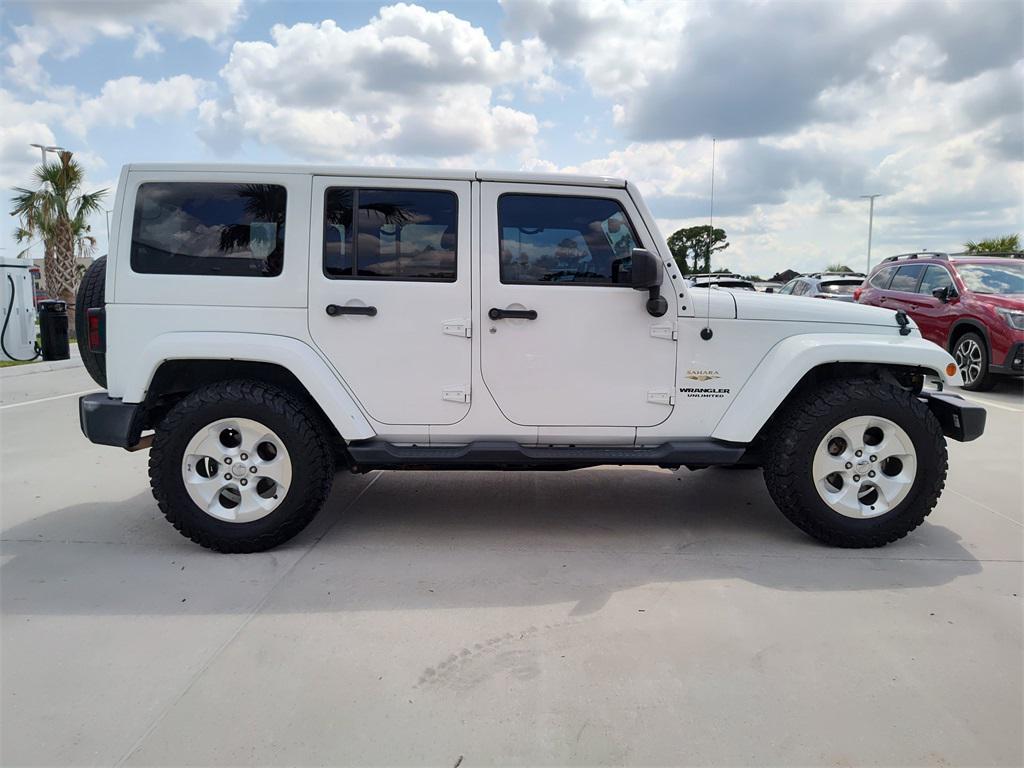 used 2015 Jeep Wrangler Unlimited car, priced at $14,494