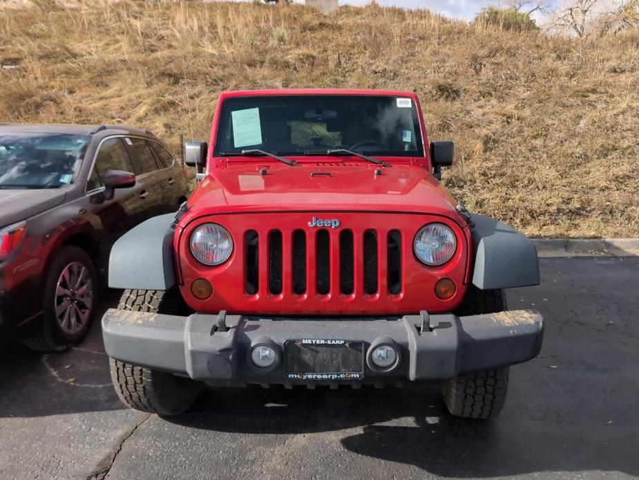 used 2010 Jeep Wrangler Unlimited car, priced at $13,988