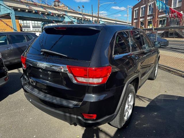 used 2011 Jeep Grand Cherokee car, priced at $9,999