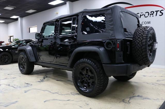 used 2015 Jeep Wrangler Unlimited car, priced at $21,999