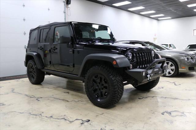 used 2015 Jeep Wrangler Unlimited car, priced at $21,999