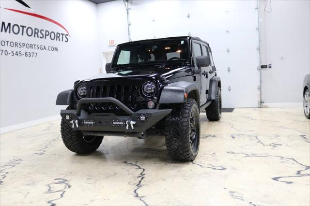 used 2015 Jeep Wrangler Unlimited car, priced at $21,999