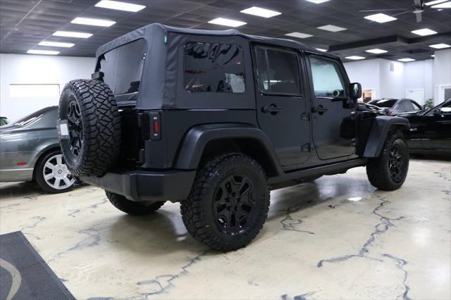 used 2015 Jeep Wrangler Unlimited car, priced at $21,999