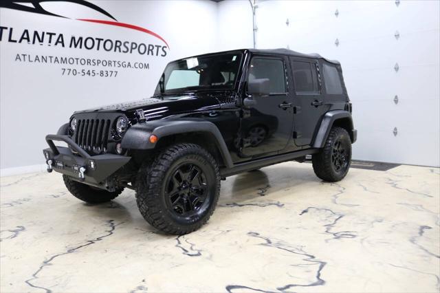 used 2015 Jeep Wrangler Unlimited car, priced at $21,999