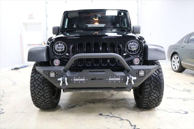 used 2015 Jeep Wrangler Unlimited car, priced at $21,999