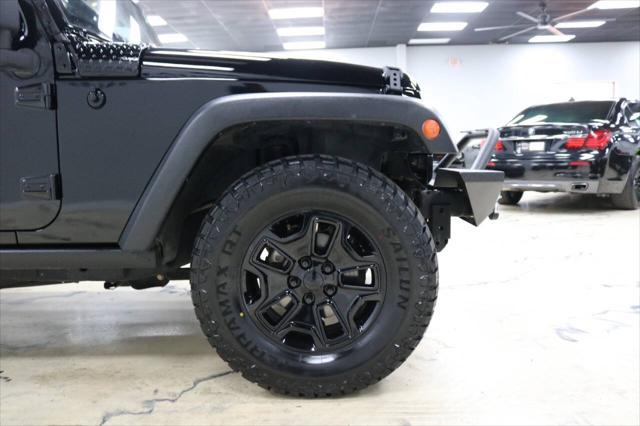 used 2015 Jeep Wrangler Unlimited car, priced at $21,999