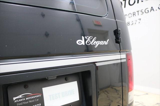 used 1999 Ford E150 car, priced at $9,999