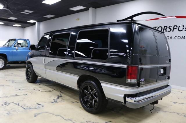 used 1999 Ford E150 car, priced at $9,999