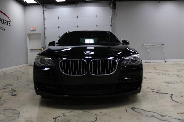 used 2013 BMW 750 car, priced at $15,999