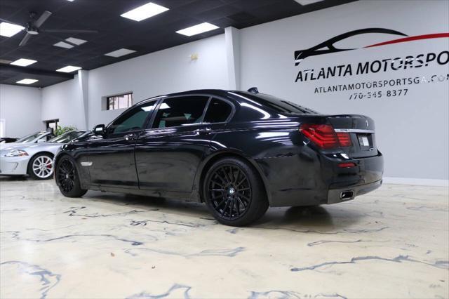 used 2013 BMW 750 car, priced at $15,999