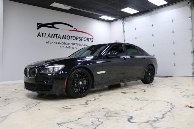 used 2013 BMW 750 car, priced at $15,999