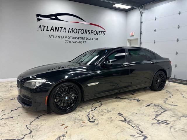 used 2013 BMW 750 car, priced at $15,999