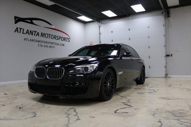 used 2013 BMW 750 car, priced at $15,999