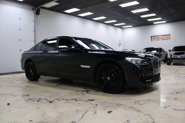 used 2013 BMW 750 car, priced at $15,999