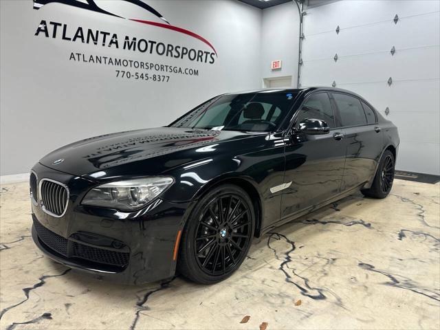 used 2013 BMW 750 car, priced at $15,999