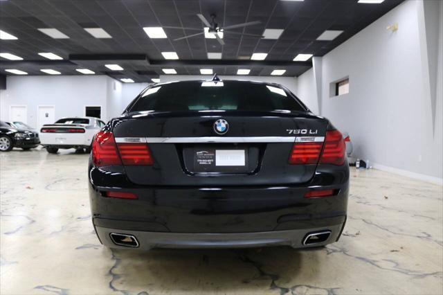 used 2013 BMW 750 car, priced at $15,999