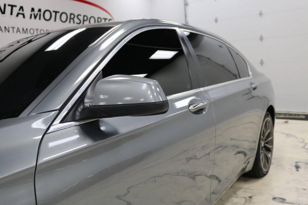 used 2010 BMW 750 car, priced at $6,999