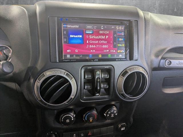 used 2016 Jeep Wrangler Unlimited car, priced at $23,858
