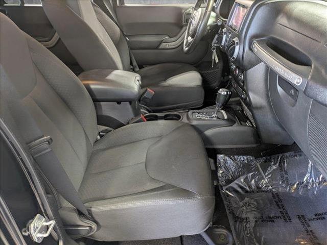 used 2016 Jeep Wrangler Unlimited car, priced at $23,858