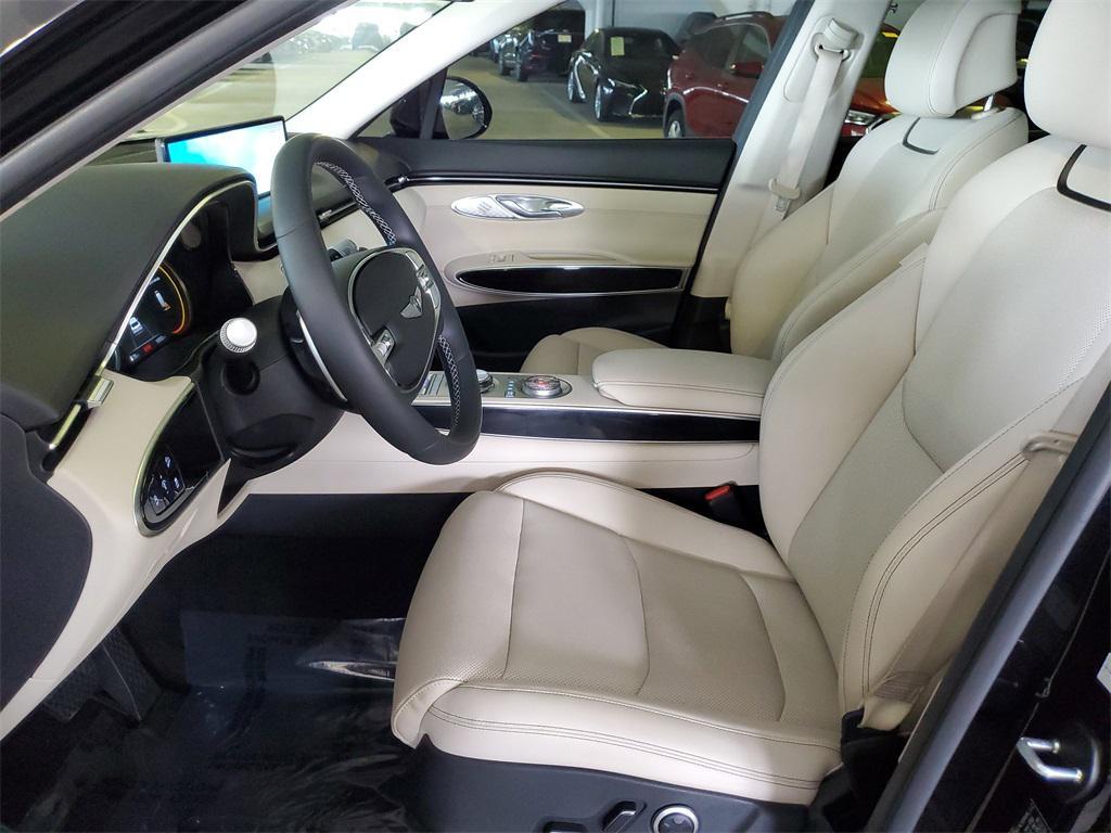 used 2024 Genesis GV70 car, priced at $41,820
