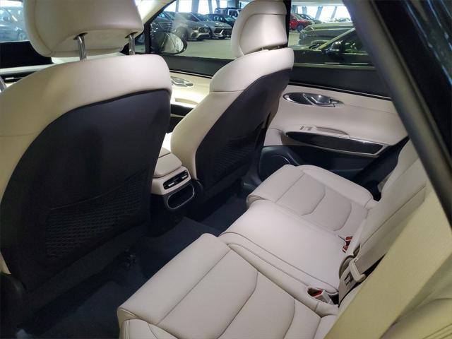 used 2023 Genesis GV70 car, priced at $37,490