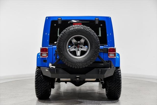 used 2015 Jeep Wrangler Unlimited car, priced at $23,641