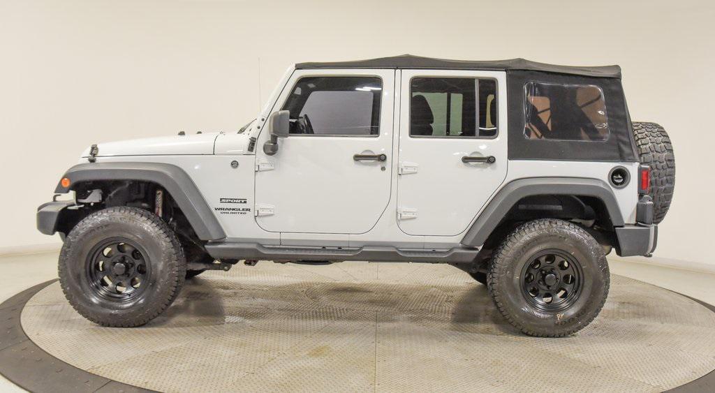 used 2015 Jeep Wrangler Unlimited car, priced at $17,489