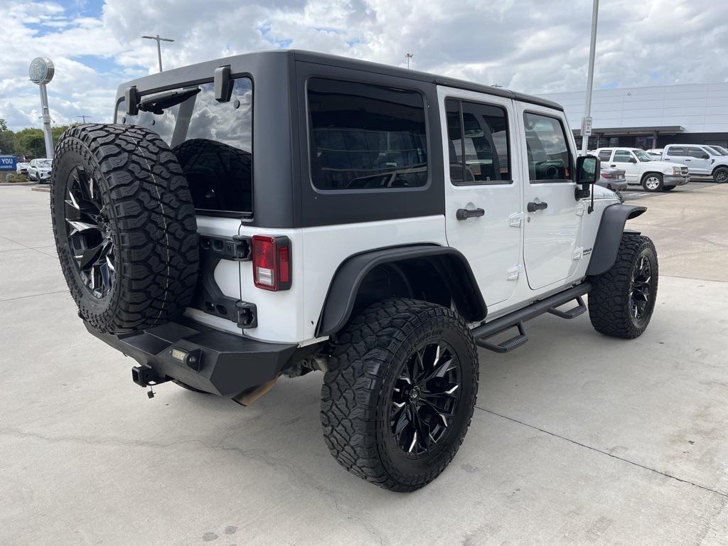 used 2015 Jeep Wrangler Unlimited car, priced at $20,534