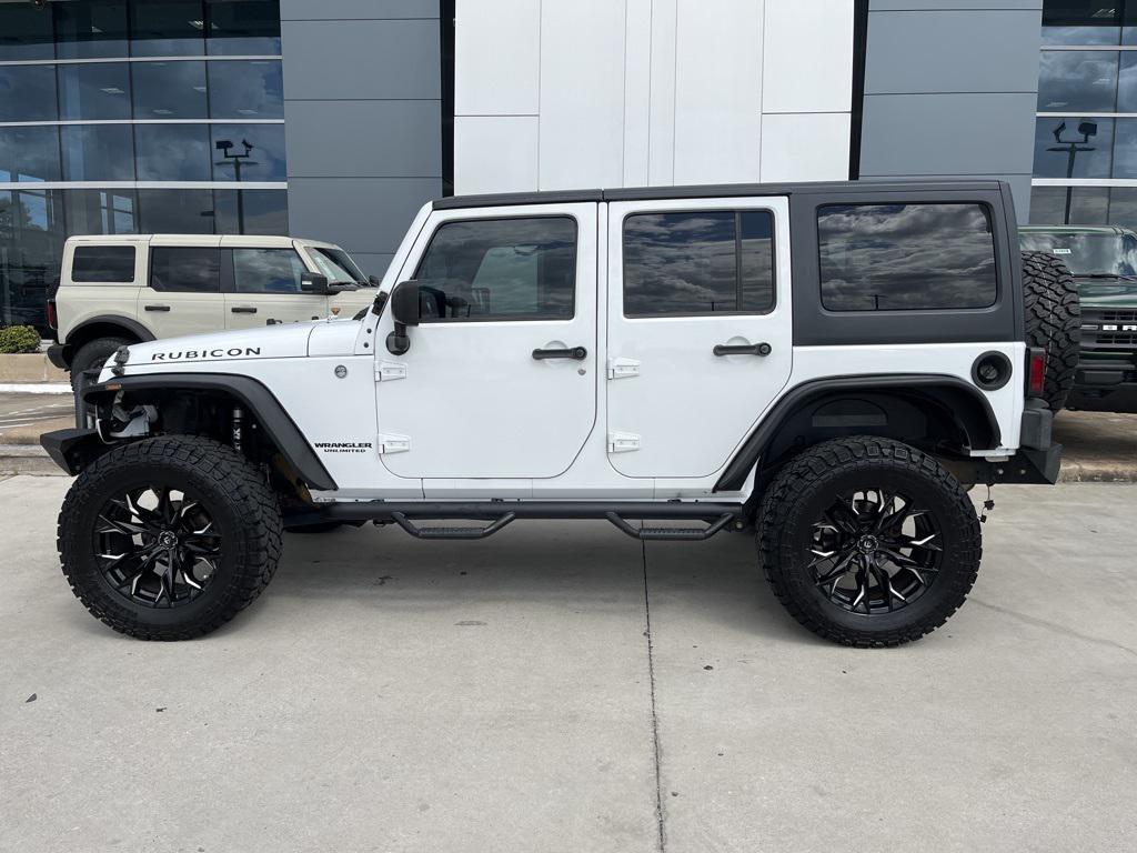 used 2015 Jeep Wrangler Unlimited car, priced at $20,534