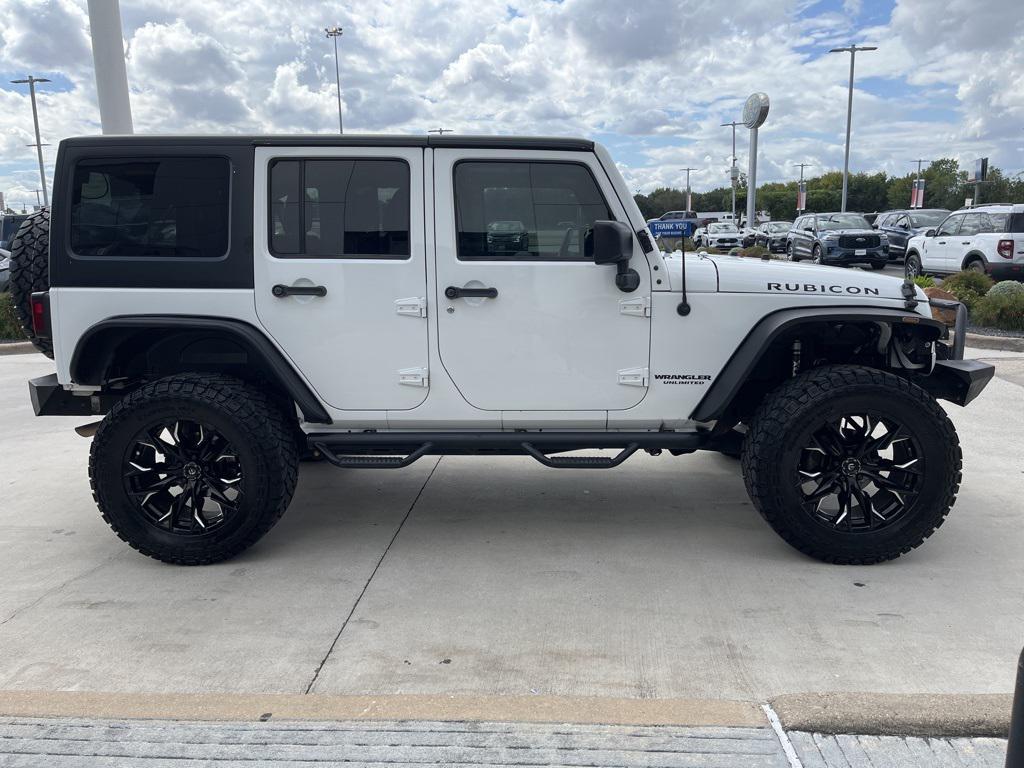 used 2015 Jeep Wrangler Unlimited car, priced at $20,534