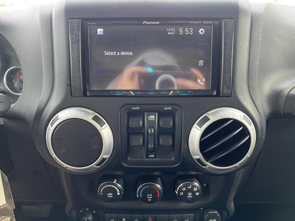 used 2015 Jeep Wrangler Unlimited car, priced at $20,534