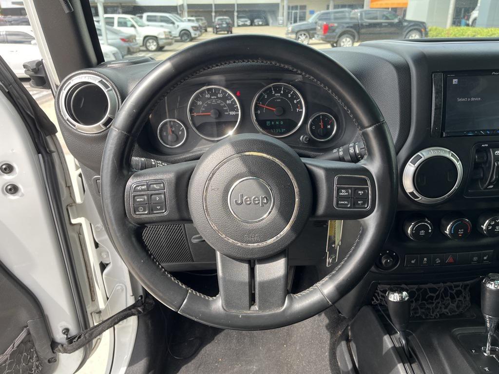 used 2015 Jeep Wrangler Unlimited car, priced at $20,534