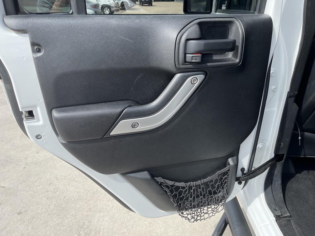 used 2015 Jeep Wrangler Unlimited car, priced at $20,534