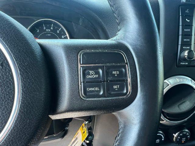 used 2015 Jeep Wrangler Unlimited car, priced at $21,998