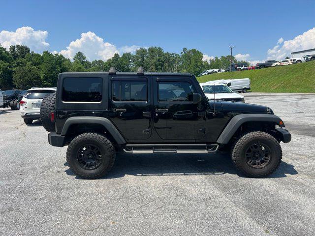 used 2015 Jeep Wrangler Unlimited car, priced at $15,997